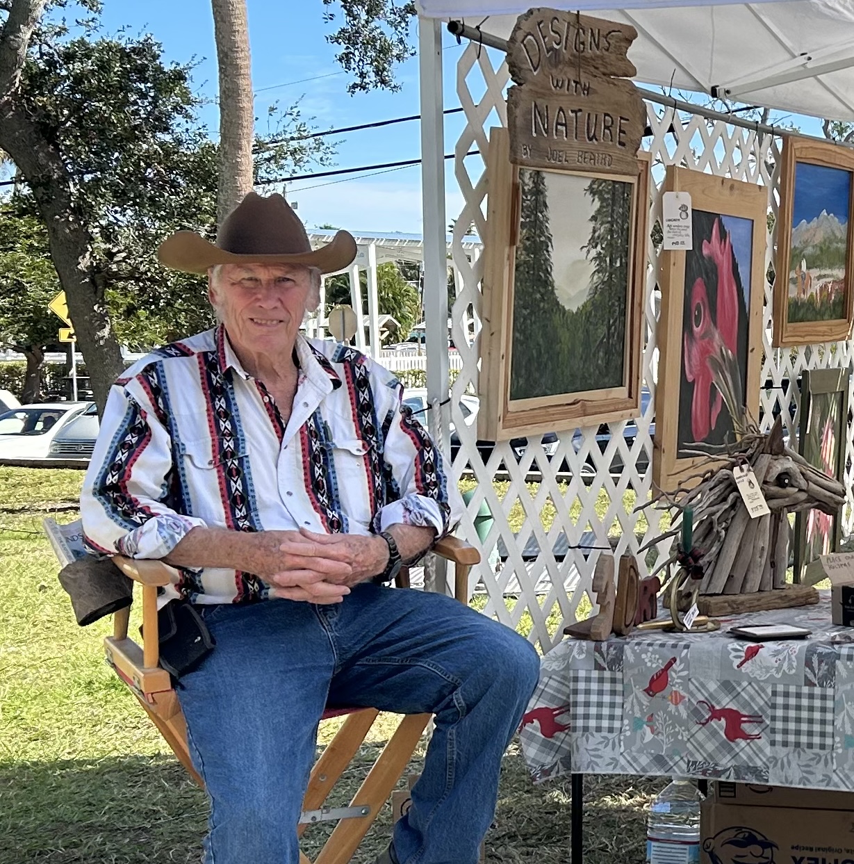 Photo of Joel Beaird at an art show.